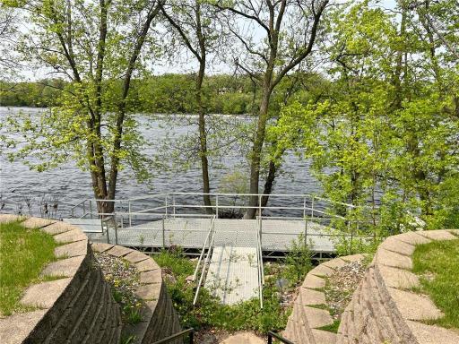 Modern ONE LEVEL LIVING Just STEPS TO THE RIVER, PARK, WALKING PATHS!! Come For A Visit-Fall In Love-Be In By SUMMER!!