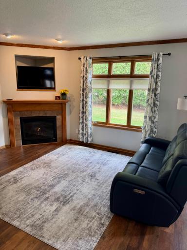 Beautiful windows letting the natural light in and the updated flooring that warms the living area up!