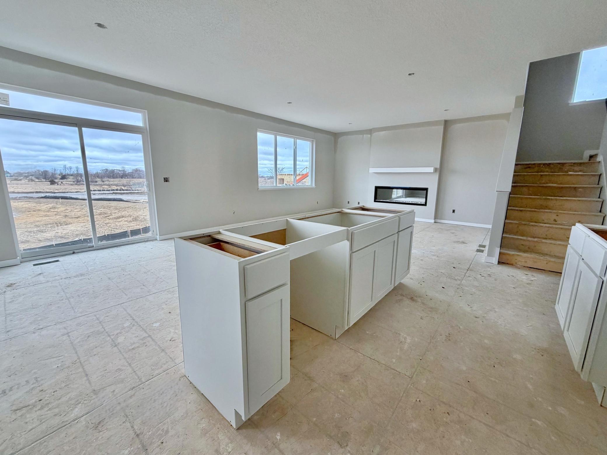 3199 Jandura Ave NE- Photo of actual home. LVP flooring and countertops will be installed soon.