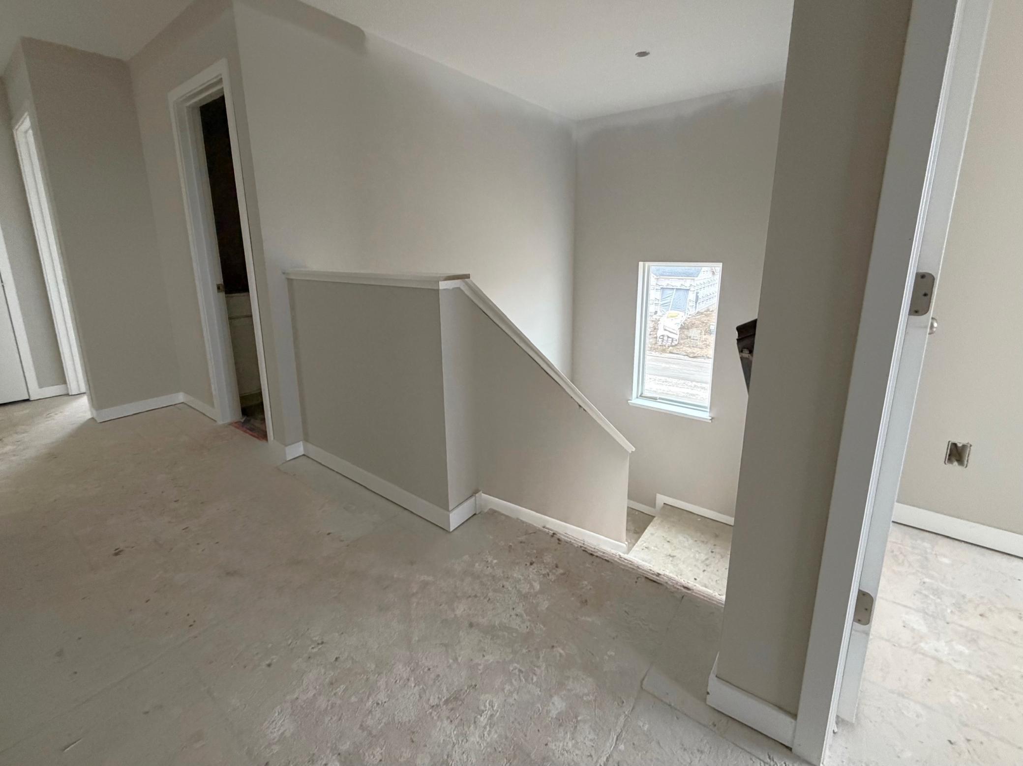 3199 Jandura Ave NE- Photo of actual home. Upper floor hallway view.