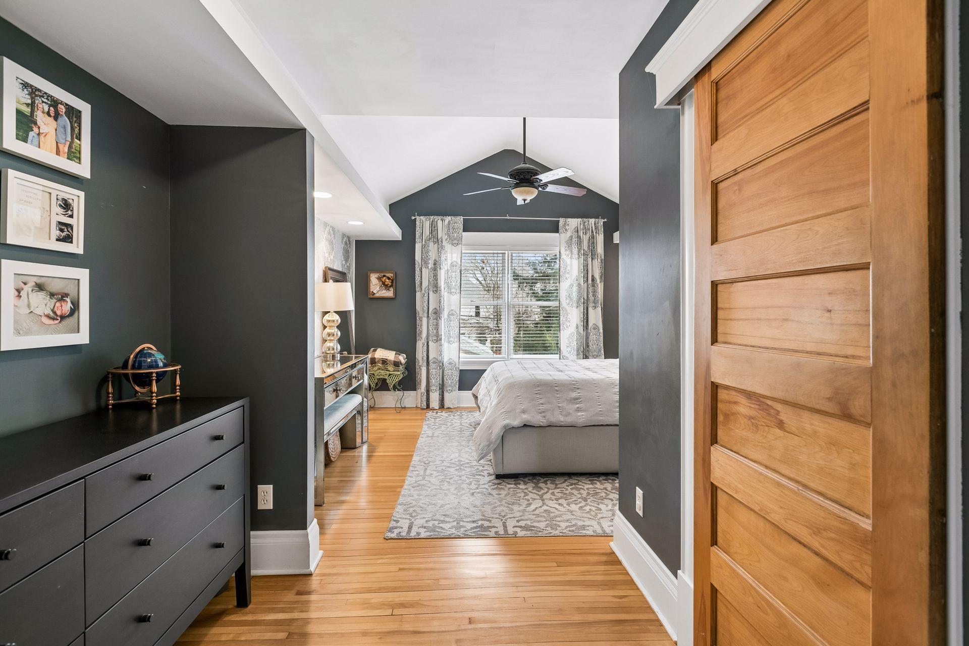 Large primary suite with vaulted ceilings and huge walk in closet.