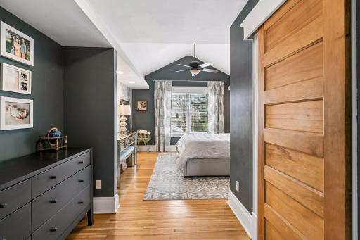 Large primary suite with vaulted ceilings and huge walk in closet.