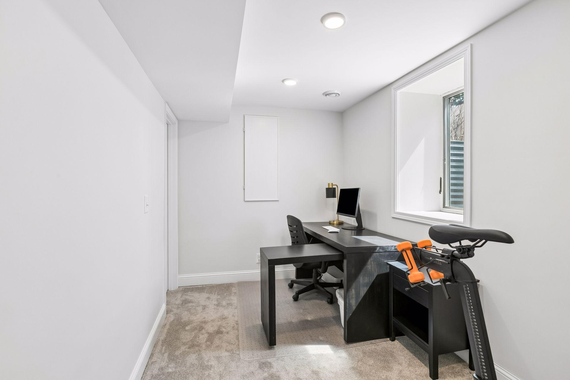 Bedroom #4,currently used as a home office/exercise room.