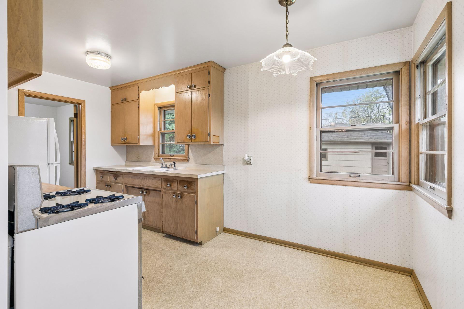 kitchen has space dining table! would be a great spot for a breakfast nook!