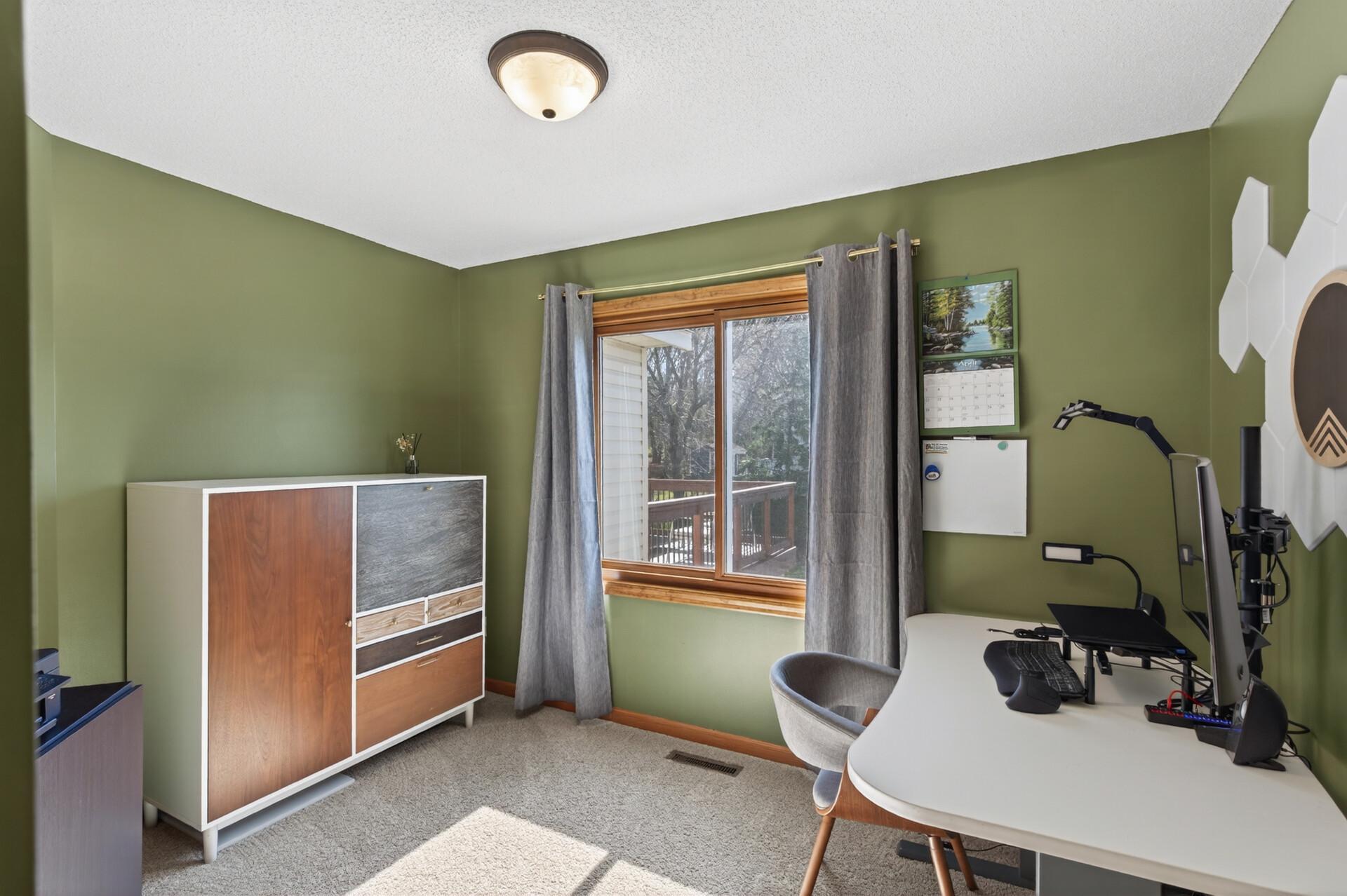 Additional bedroom on this level currently utilized for an in home office.