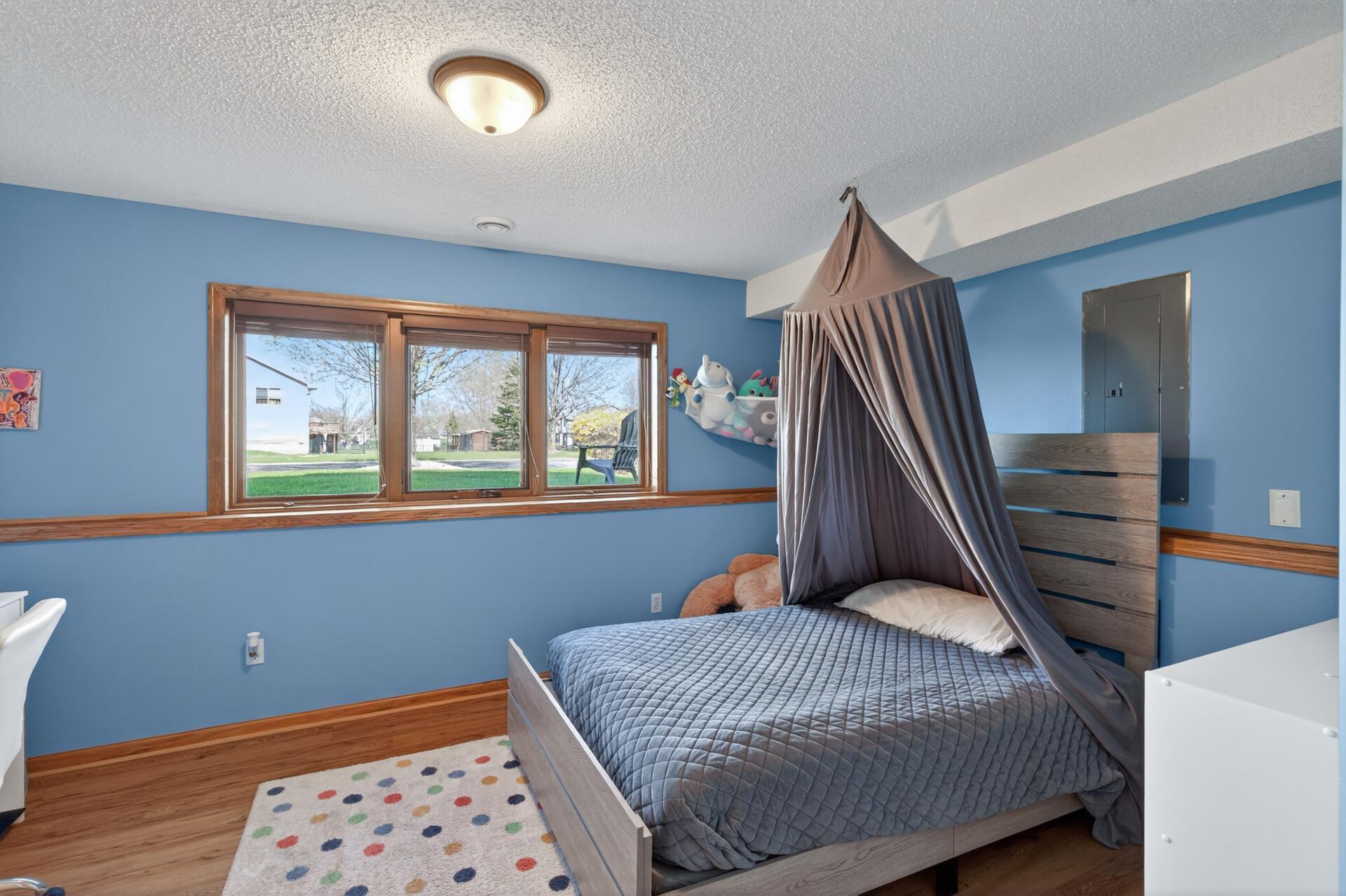 4th Bedroom wit new flooring plus bathroom location between the 2 bedrooms