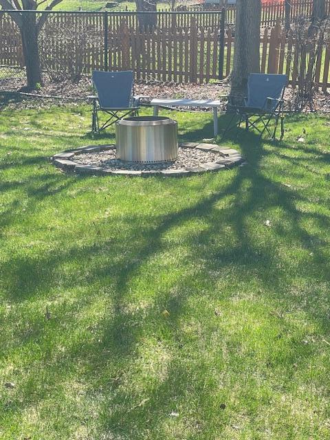 Appreciate the backyard privacy while you enjoy a fire