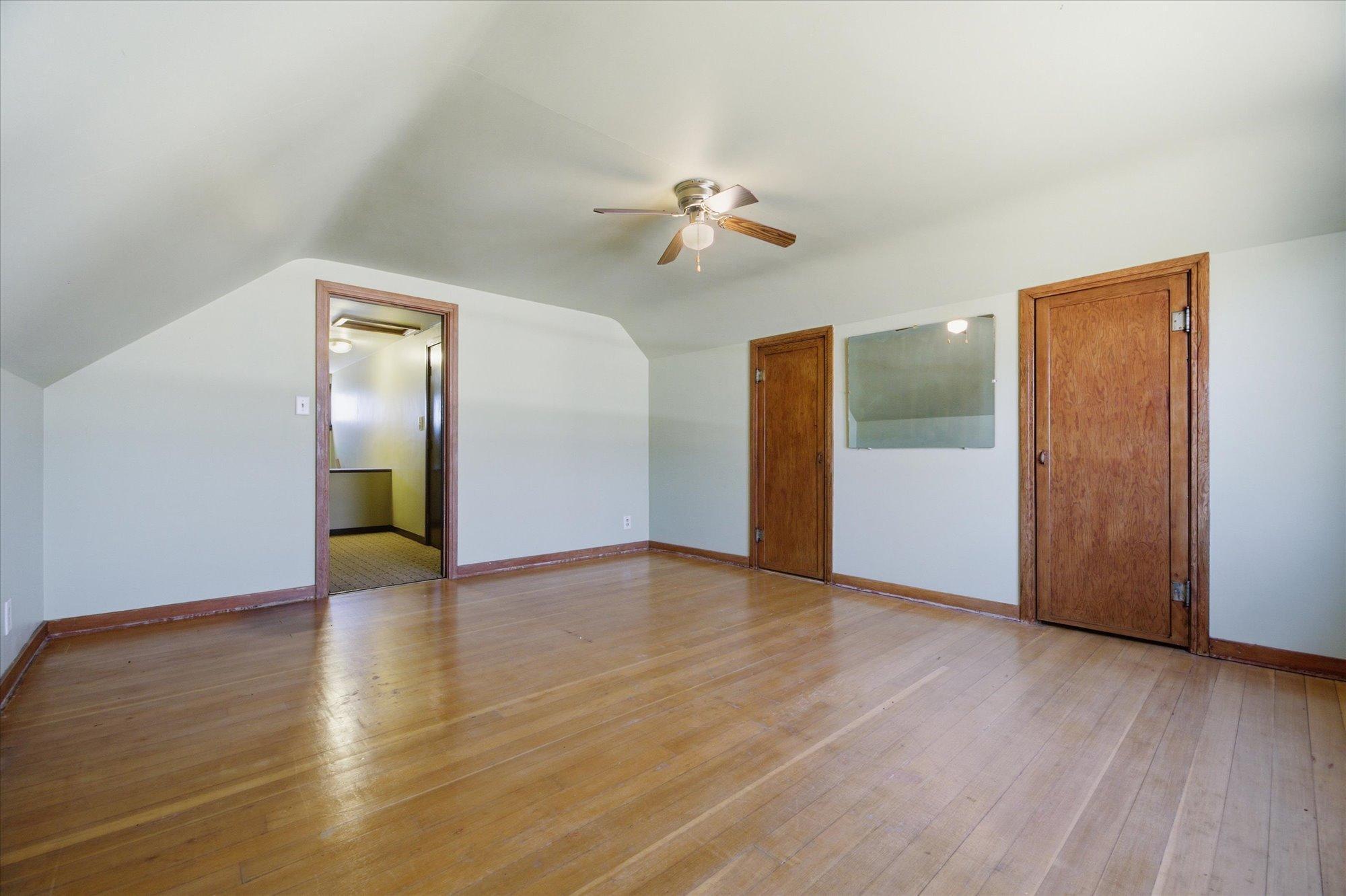 Fourth Bedroom, second floor. One door opens to walk in attic. Second door is closet.