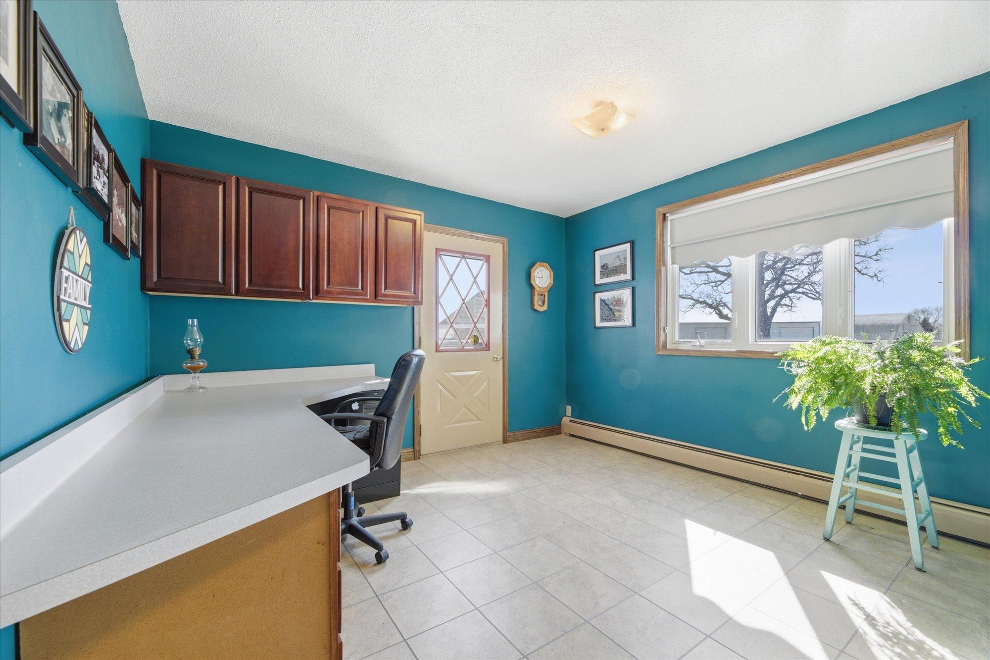 Flex Room. Currently used as an office. Desk is not attached.