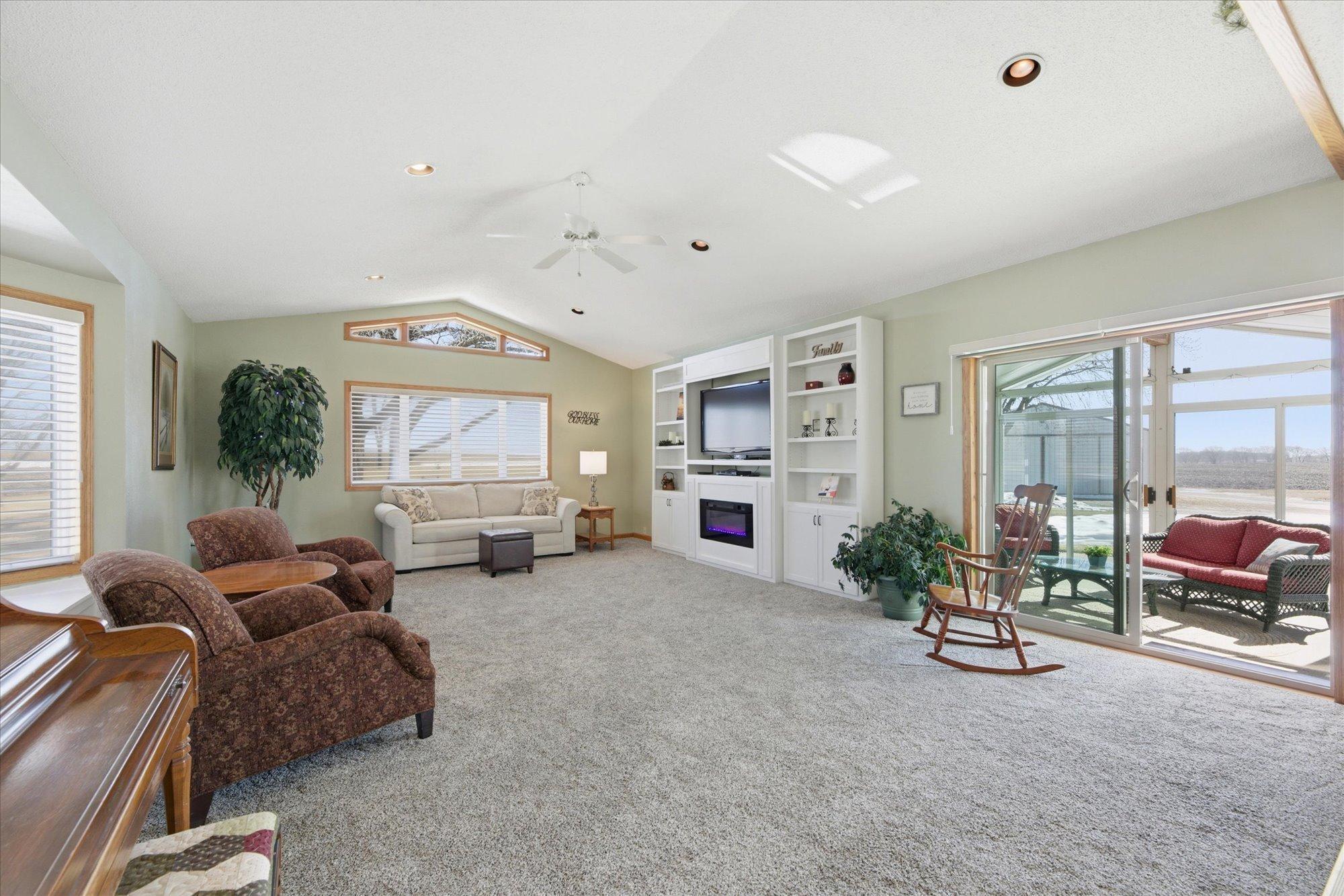 LOOK at the Sunroom off of the Living Room!