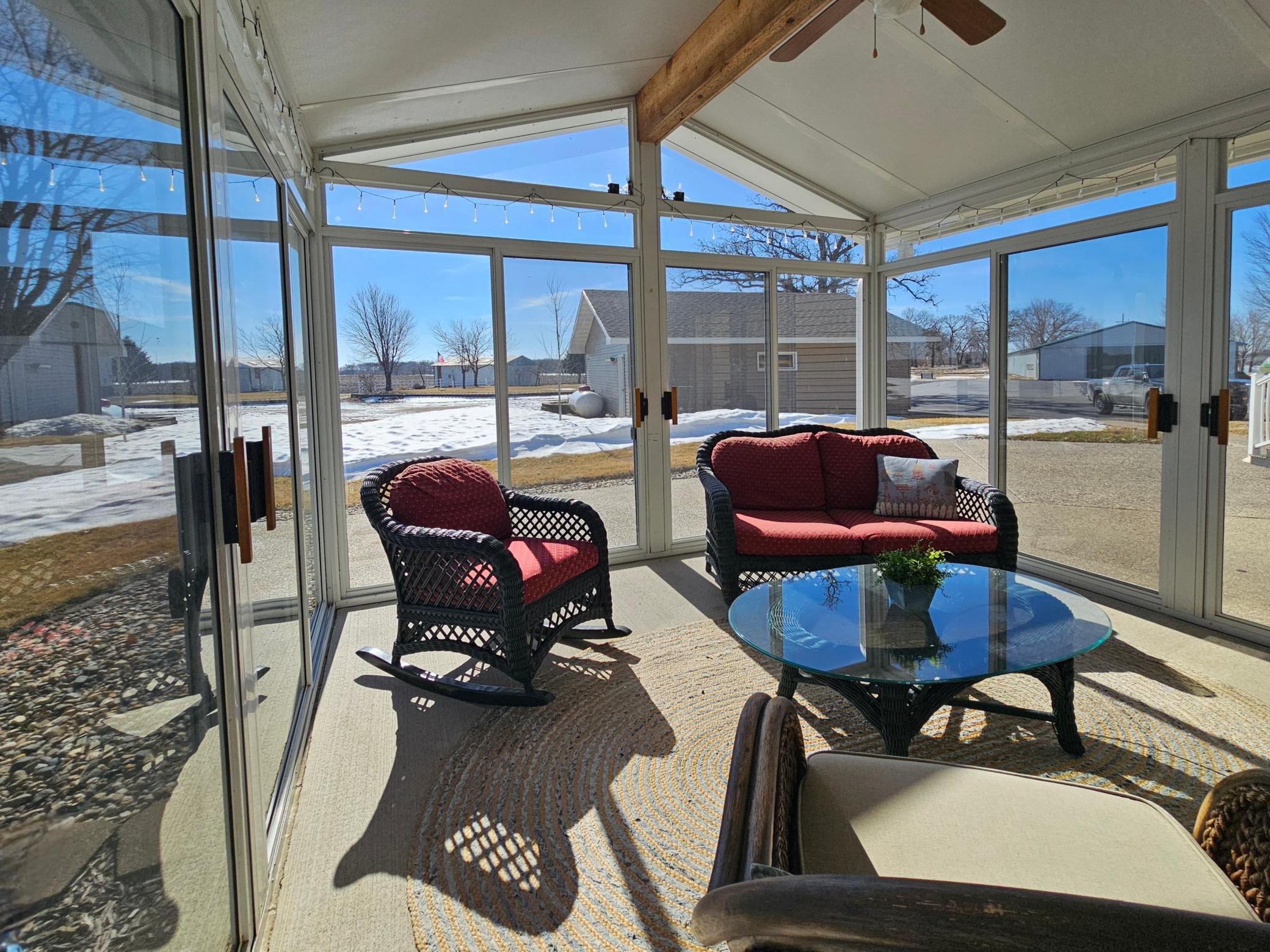 Three doors open to the yard.