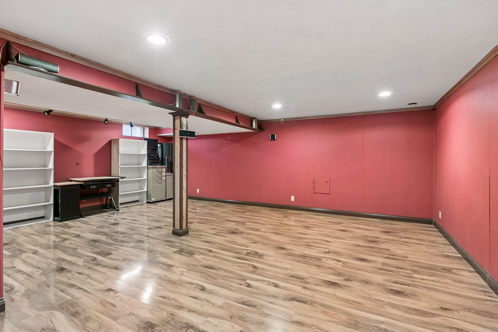 The lower level features this large and open family room