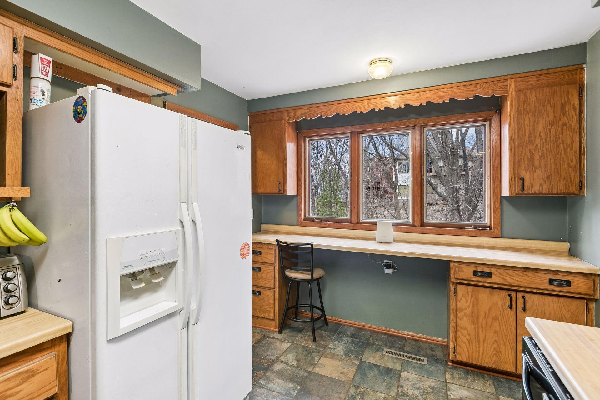 A kitchen planning desk keeps daily paperwork in its place
