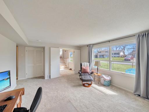 Large windows illuminate this room with ample natural light!