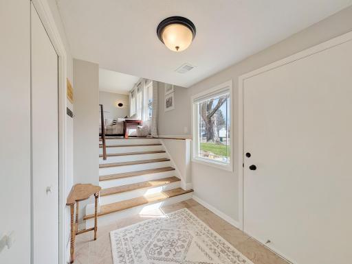 This inviting foyer is begging to welcome you home!
