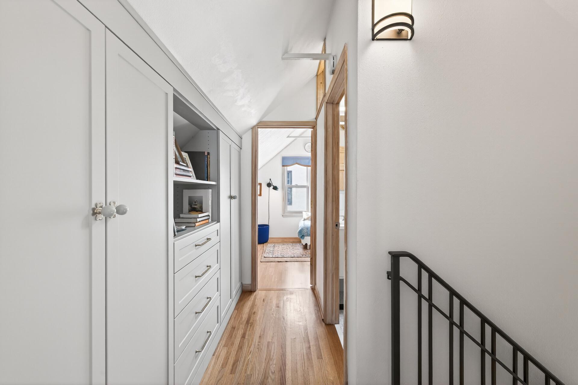 Custom built-ins were installed last year to maximize storage in the upper level