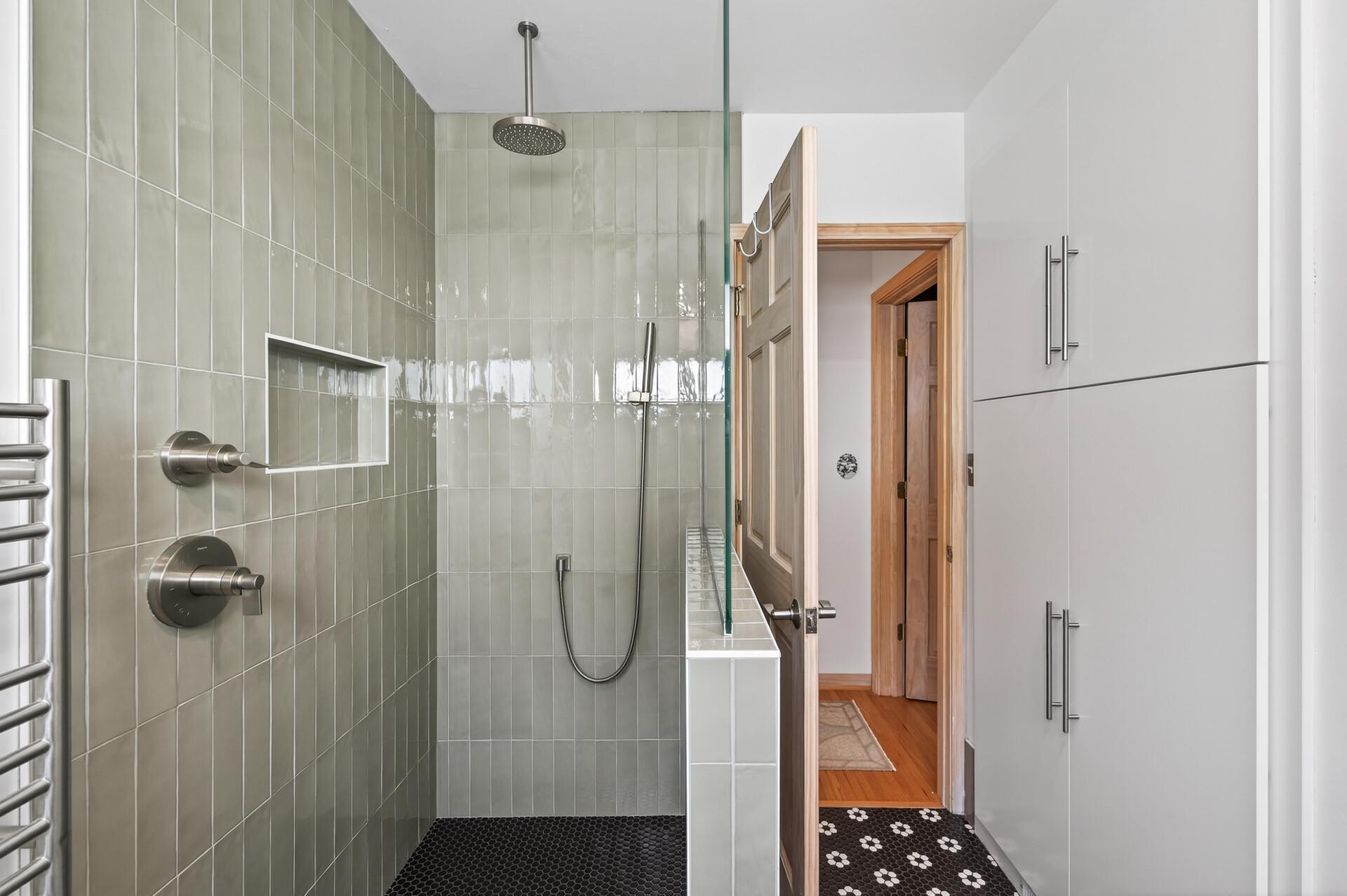 The main-level ensuite primary bathroom was updated last year!