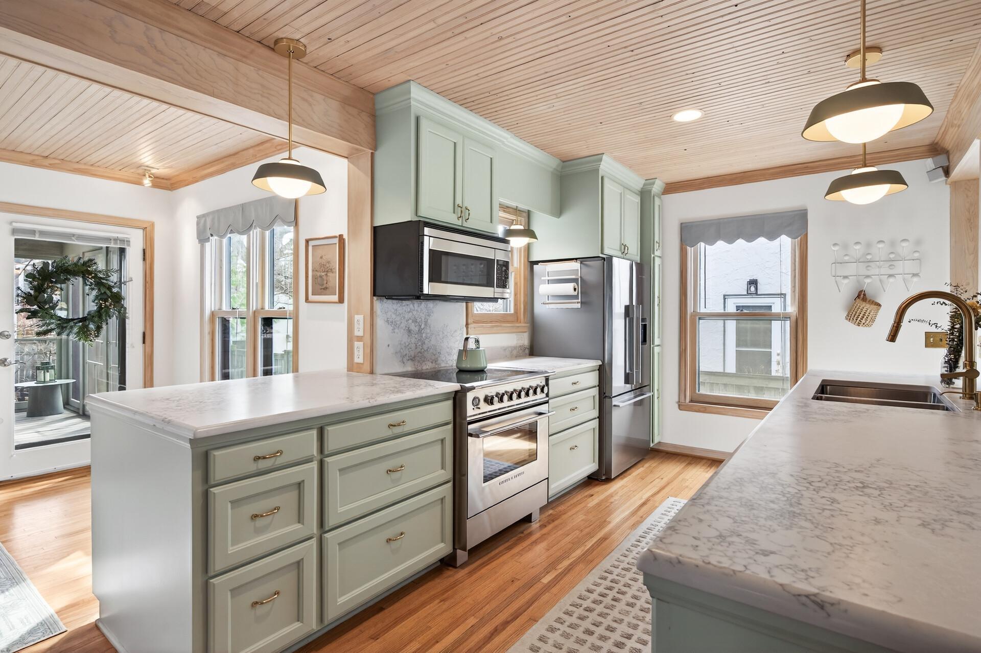 The updated cabinets add a pop of color to the space!