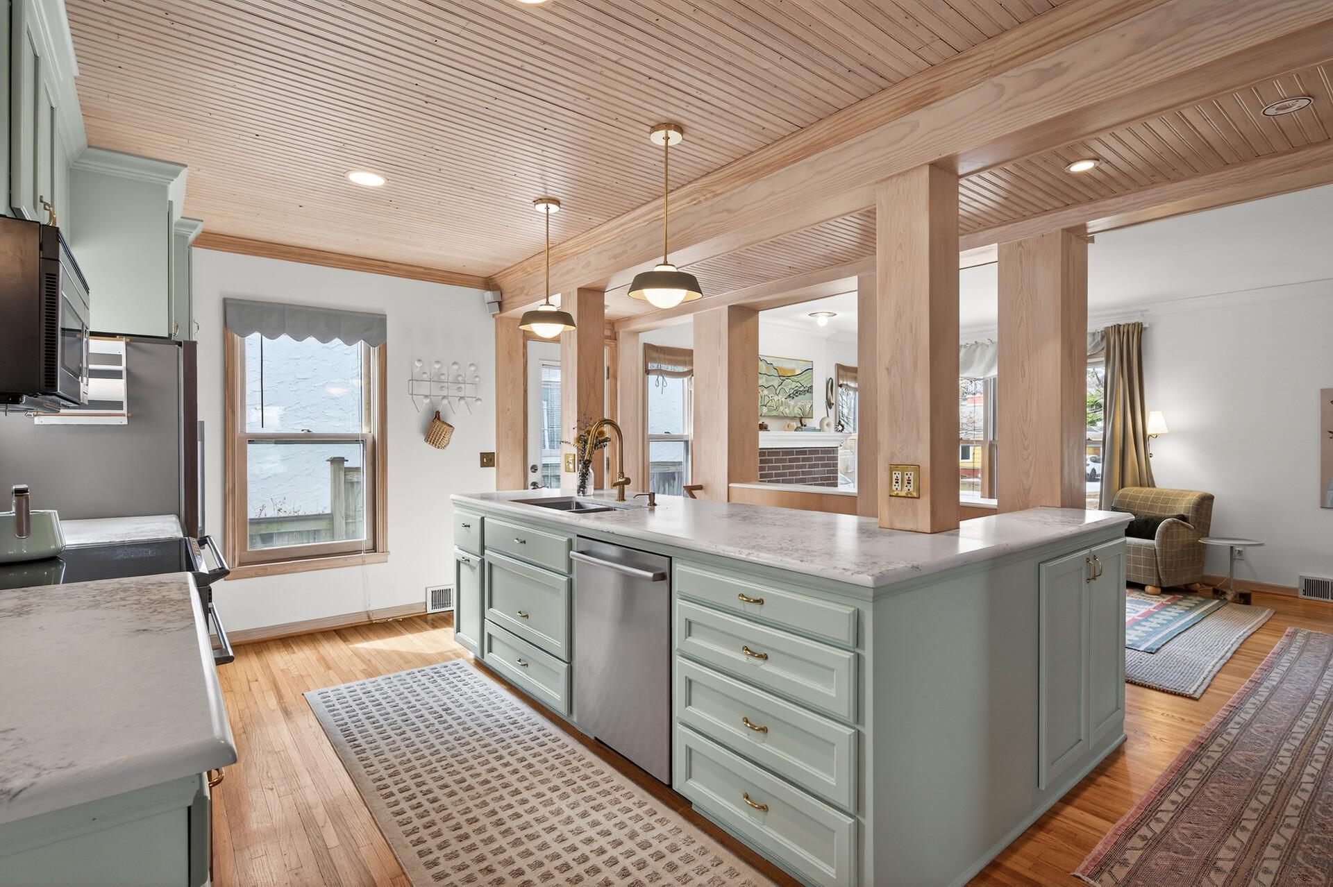 The kitchen was fully renovated in 2024 with updated lighting, hardware, and quartz countertops