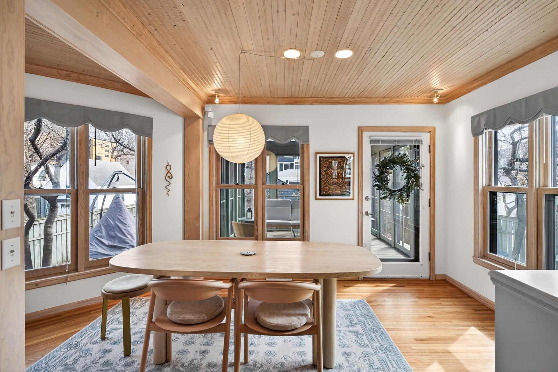 The dedicated dining room is just off the kitchen and offers easy access to the screened porch - the perfect flow for entertaining!