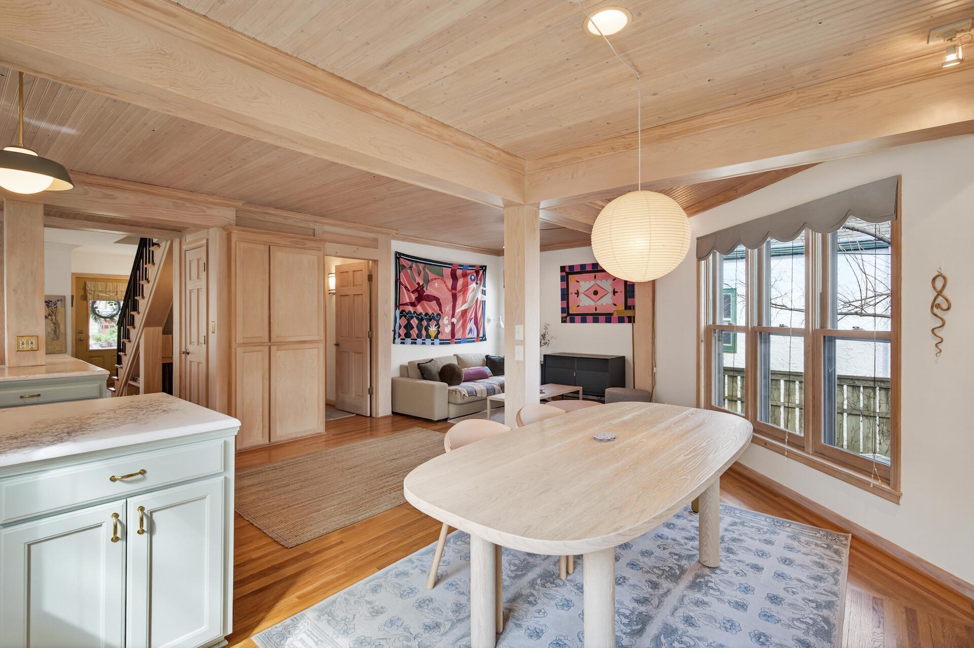 Back inside, you'll notice the seamless transition between the kitchen, dining room, and sitting room!