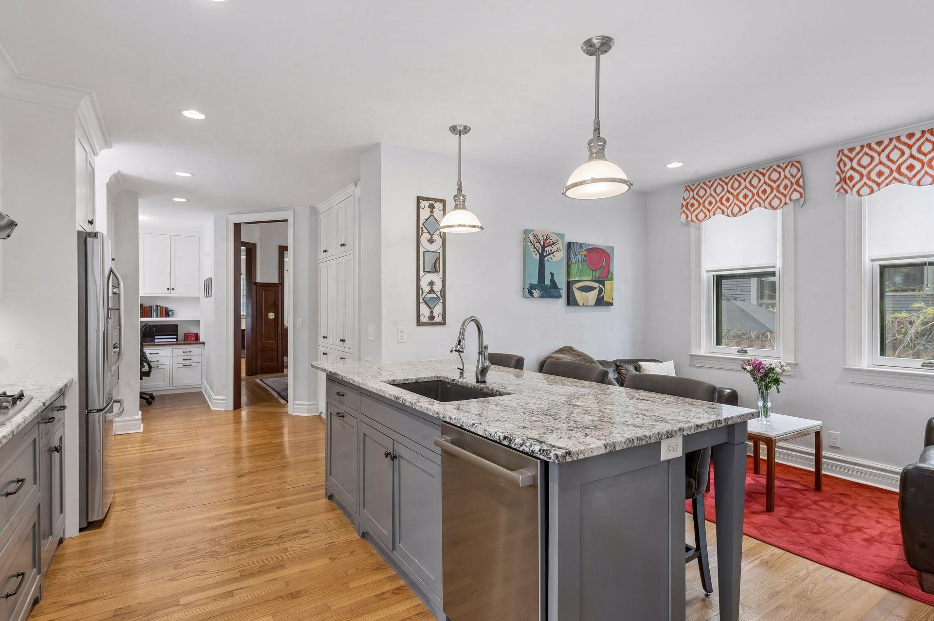 Connect with family and guest in the eat in kitchen with attached sitting room!