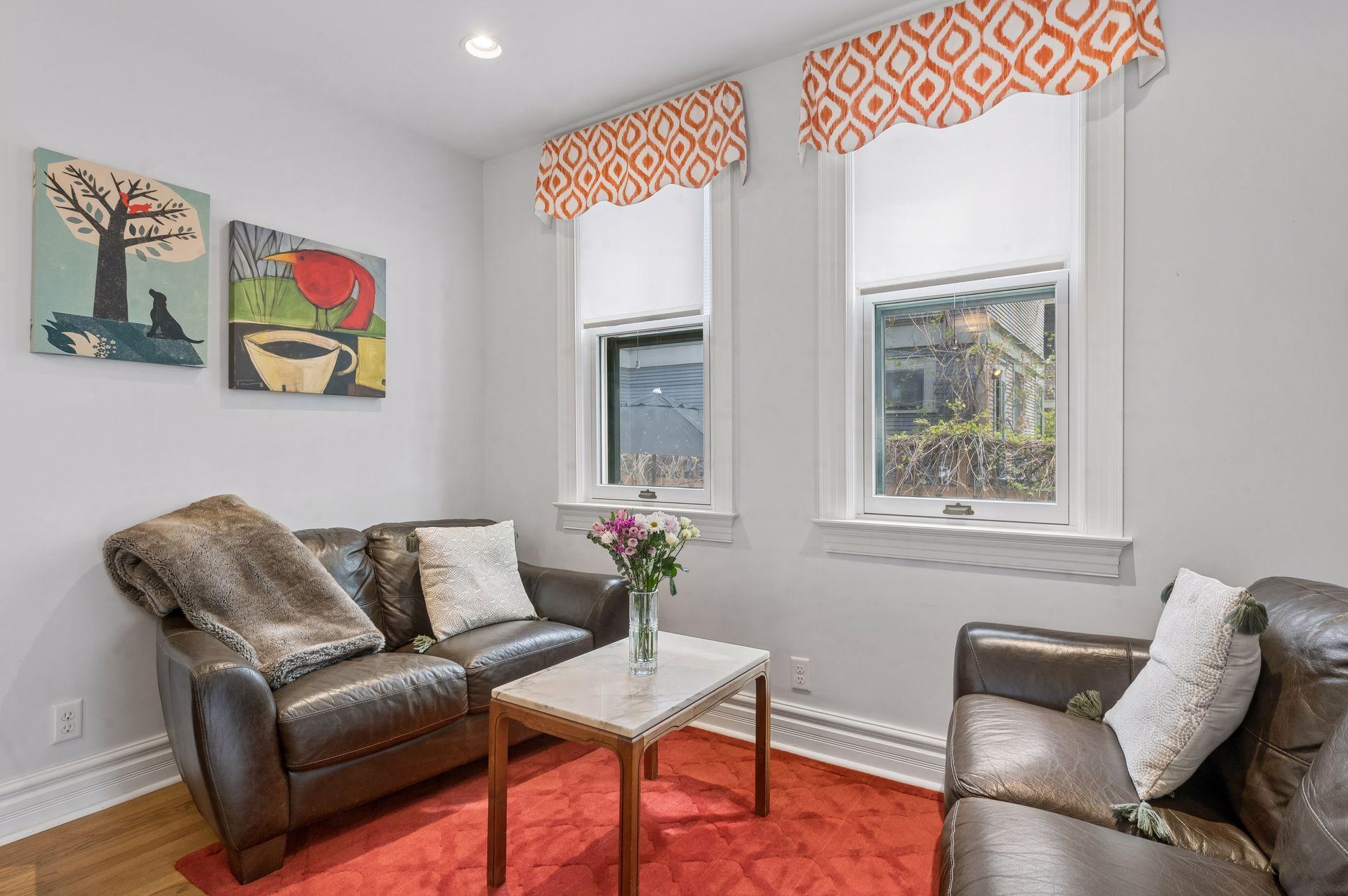 The cozy sitting room of the kitchen island is ideal for entertaining or morning coffee!