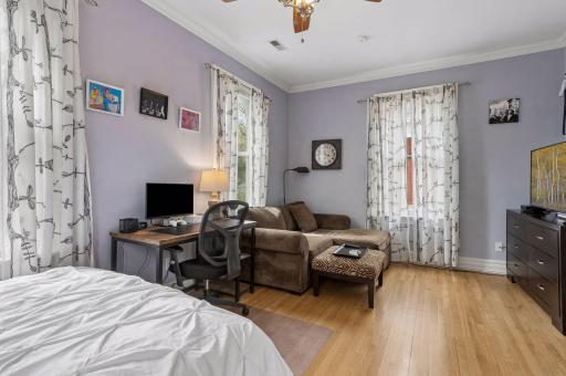 The large back bedroom spans the width of the home.