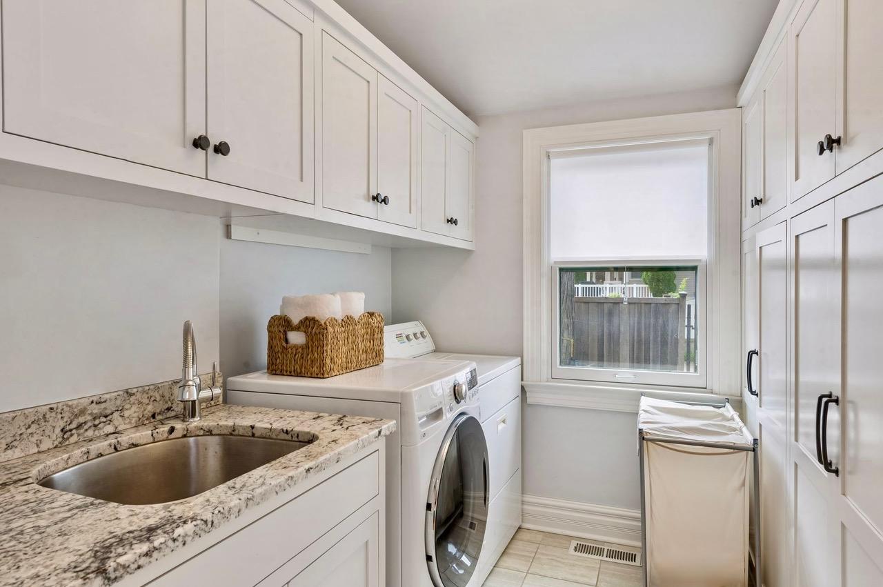 Laundry is a breeze in this beautiful main floor laundry room.