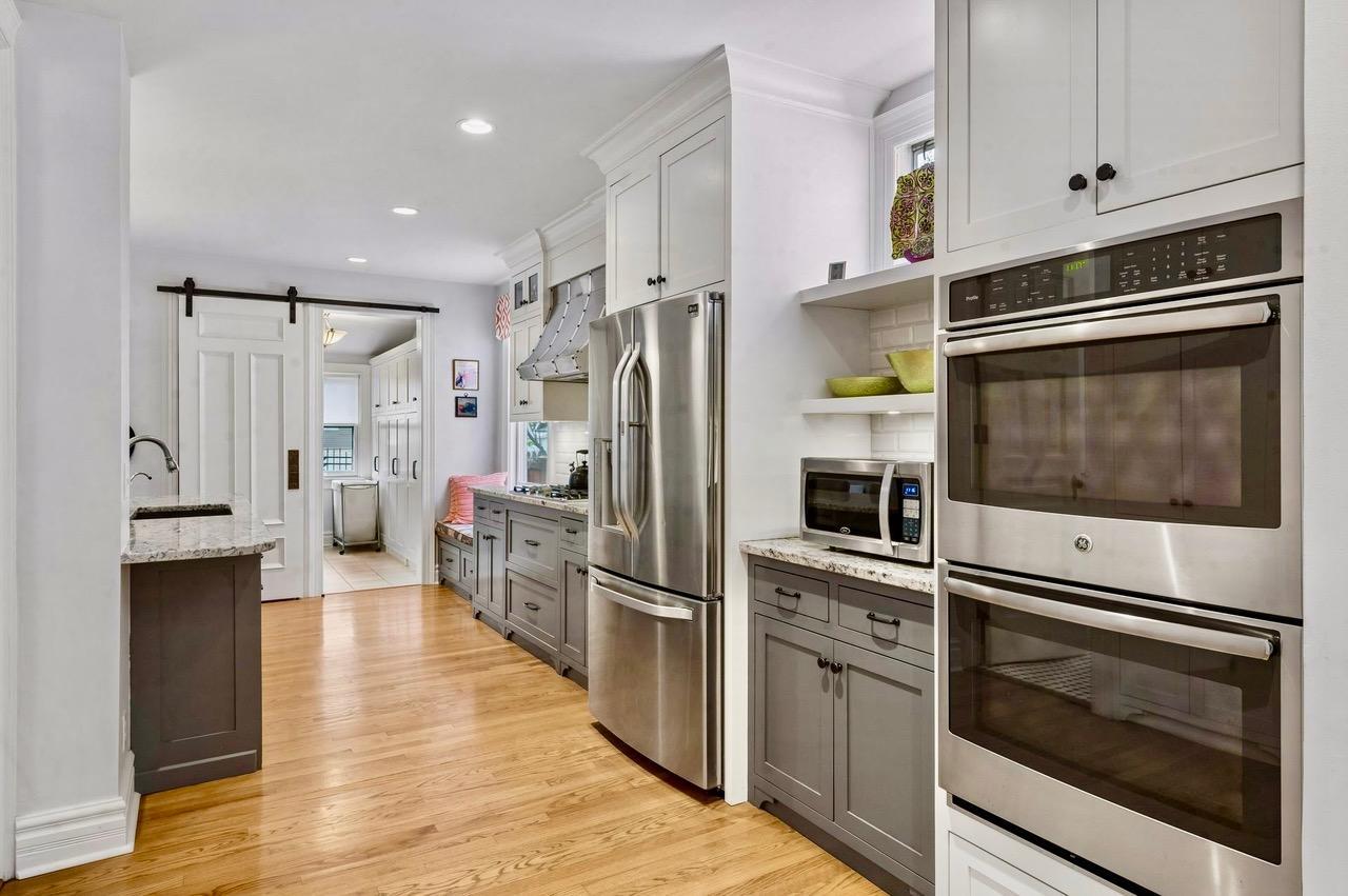Custom designed kitchen creates great flow in this exceptional renovation!