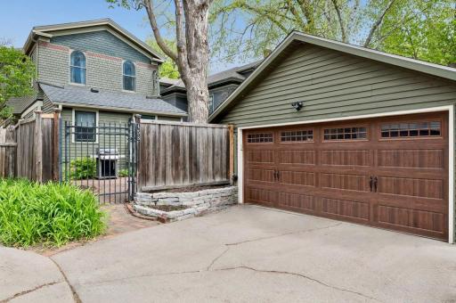 The two-car garage with concrete driveway can also provide additional guest parking.