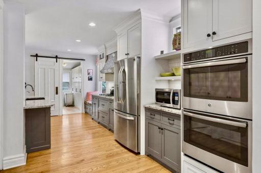 Custom-designed kitchen creates great flow in this exceptional renovation.