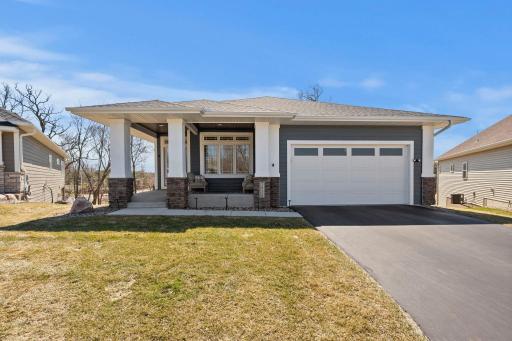 Home offers a covered front porch & extra deep 2-car garage