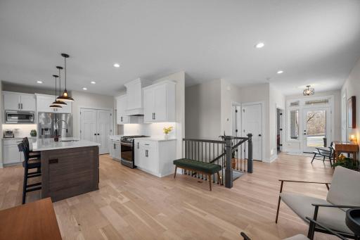 Effortless flow between the kitchen, living, and dining areas makes entertaining a breeze