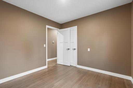 3rd bedroom with beautiful flooring.jpg