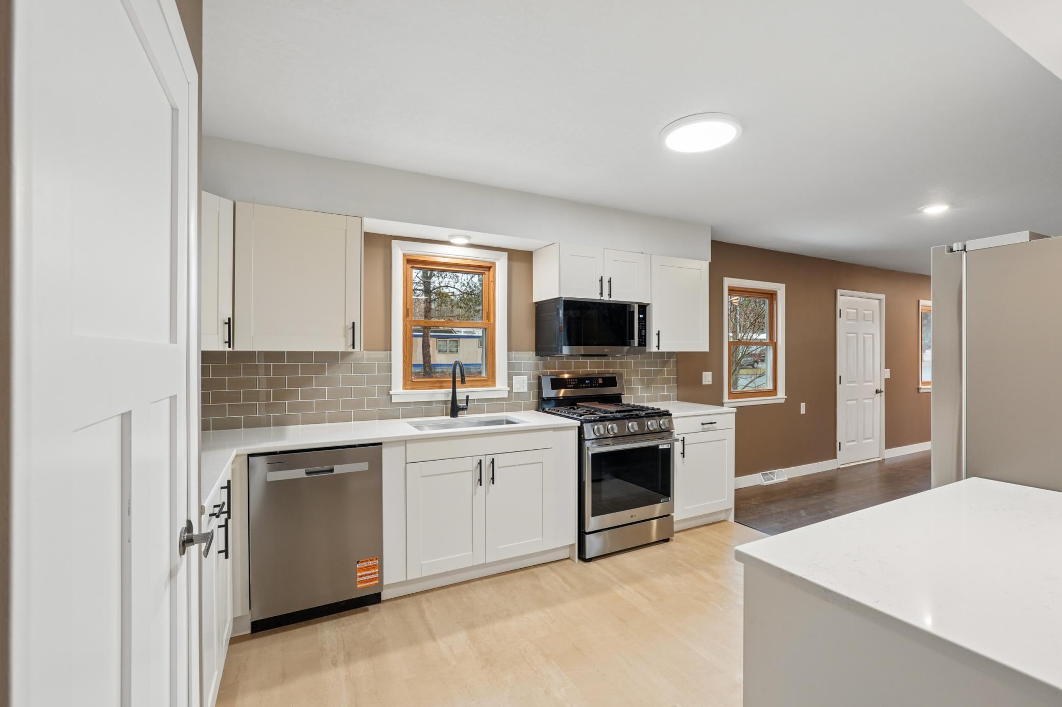 Window over the new sink and quartz countertops.jpg