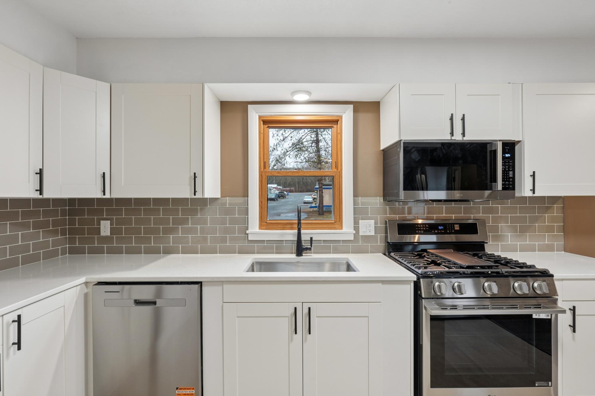 Gorgeous new cabinets and backsplash .jpg