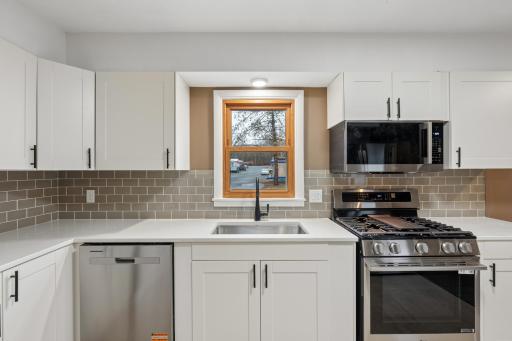 Gorgeous new cabinets and backsplash .jpg