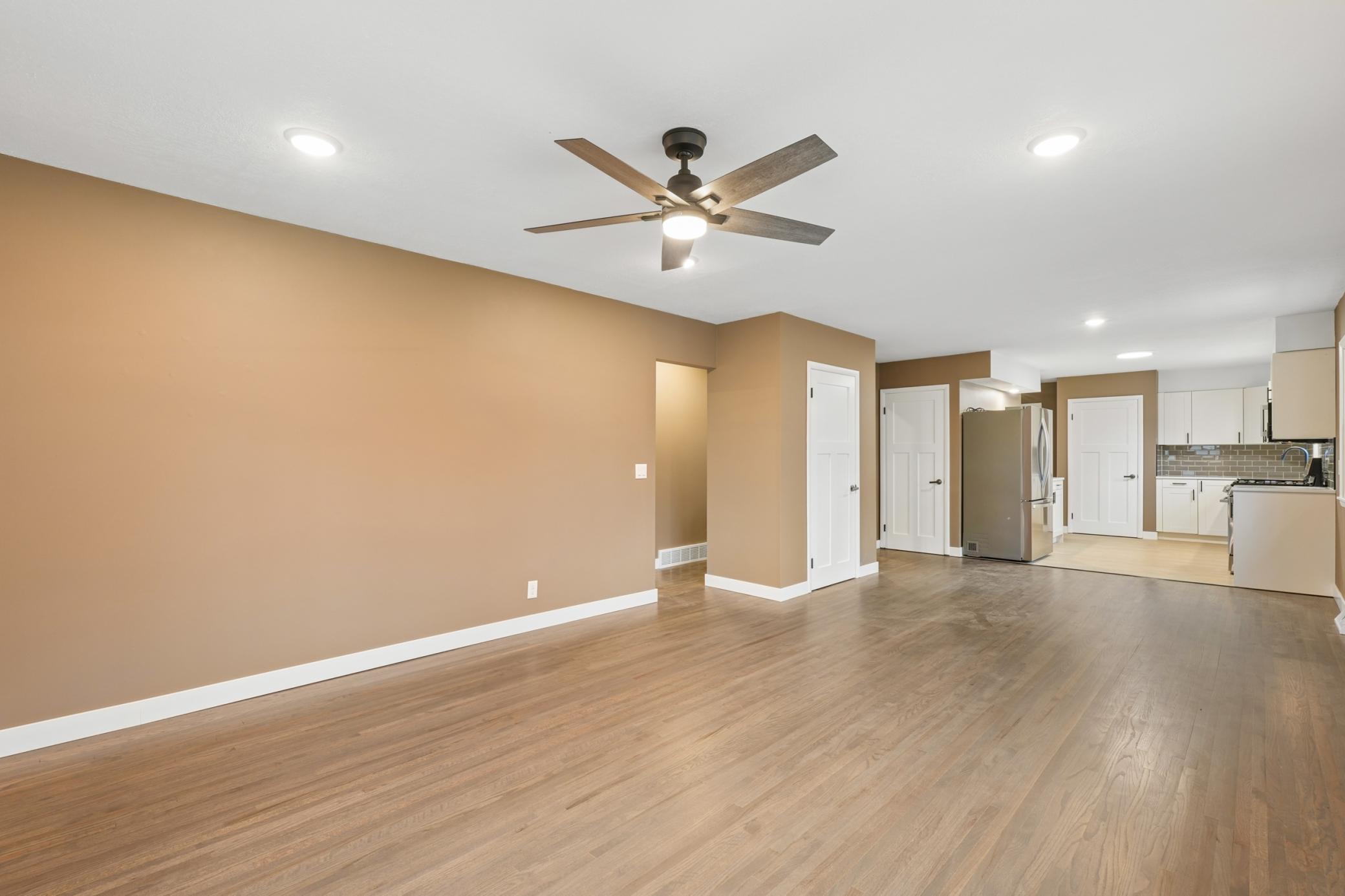 Large Livingroom with newer windows and coat closet.jpg