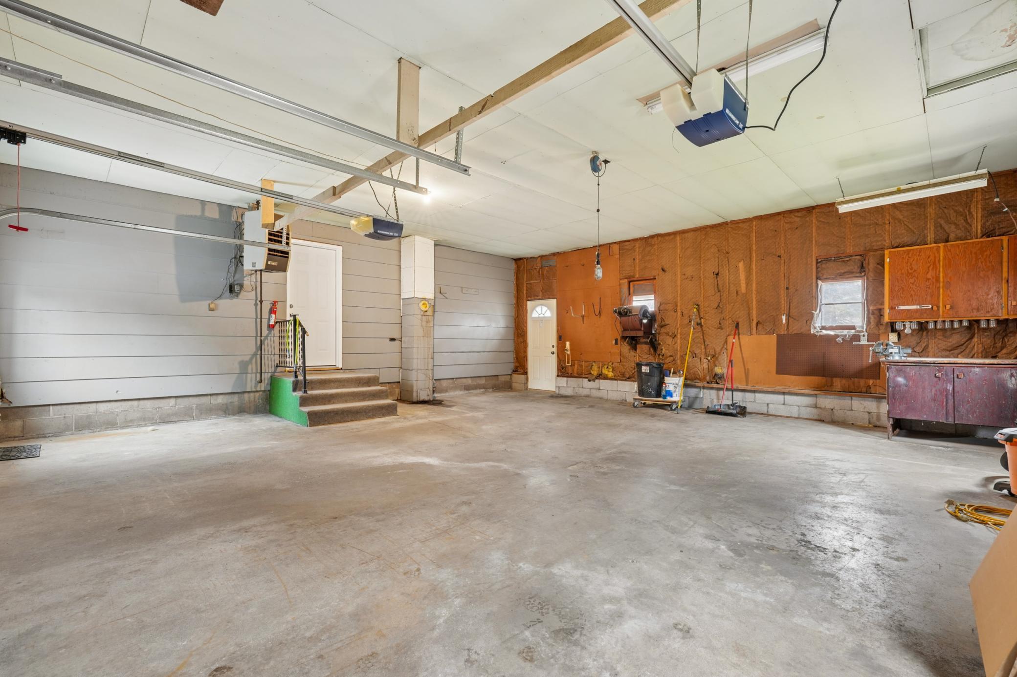 Nice big insulated garage with new garage doors.jpg