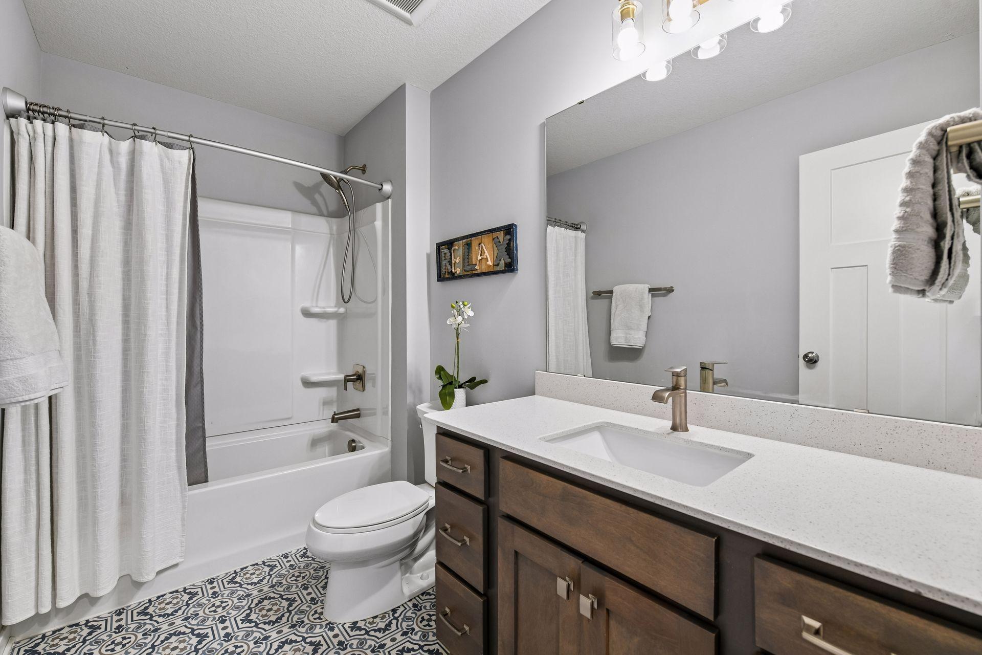 Secondary bathroom upstairs provides plenty of space