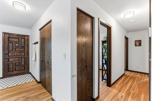 Three bedrooms are arranged together on one level, creating a clean and practical layout.