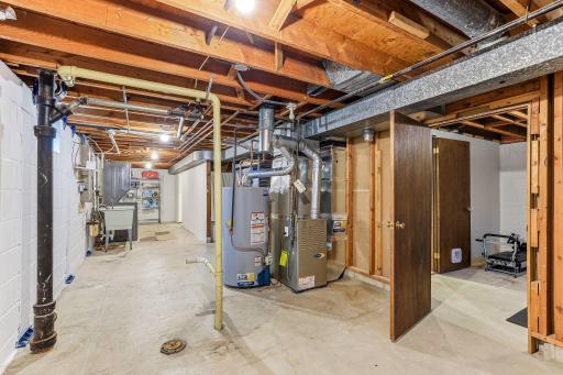 Utility room offers a dedicated space for home systems. Furnace/AC (2016), Hot Water Heater (2016)
