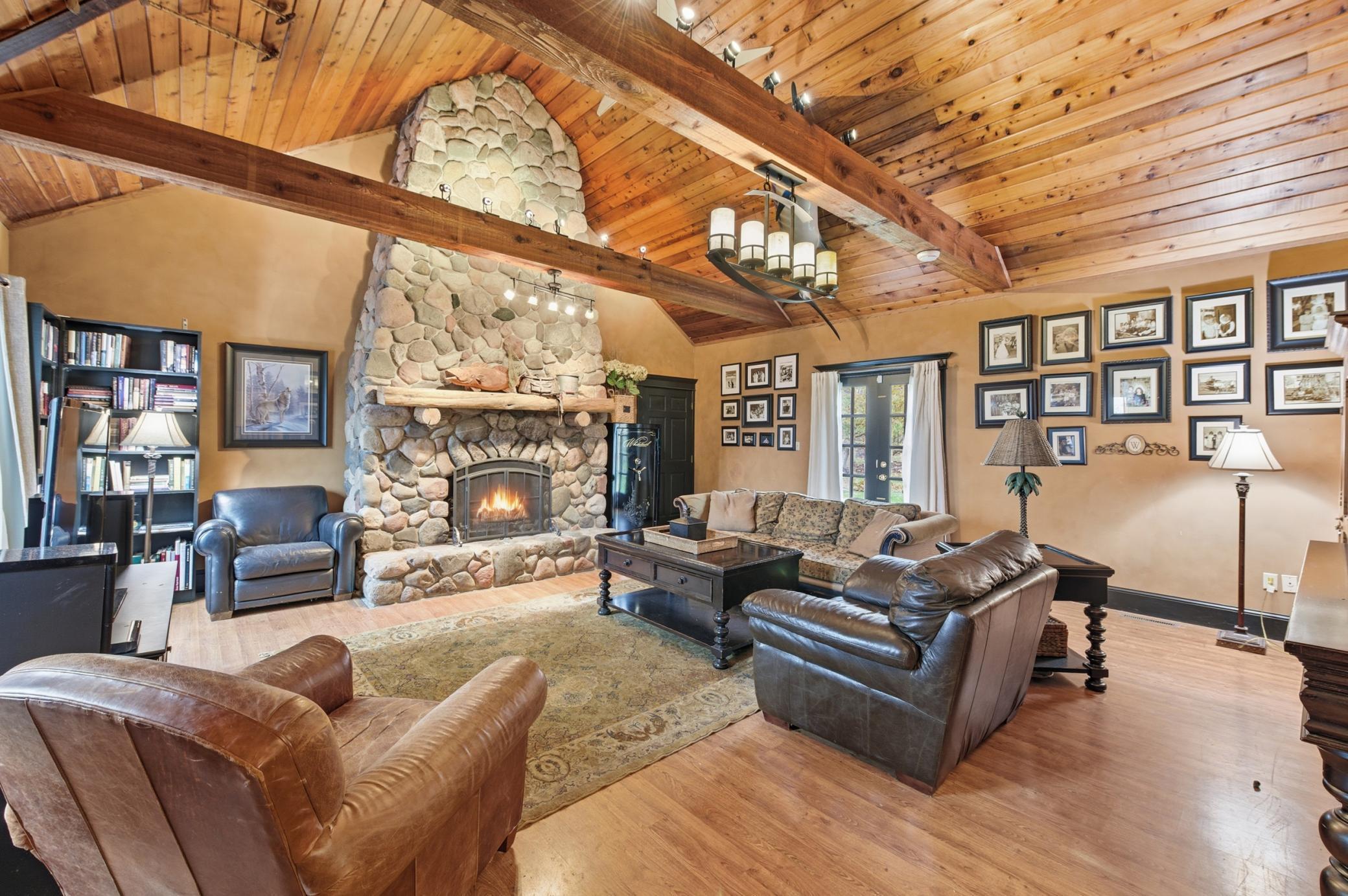 13001 Twilight Road - Cozy Great Room with Vaulted Ceilings, Beams, Library, and Wood-Burning Fireplace