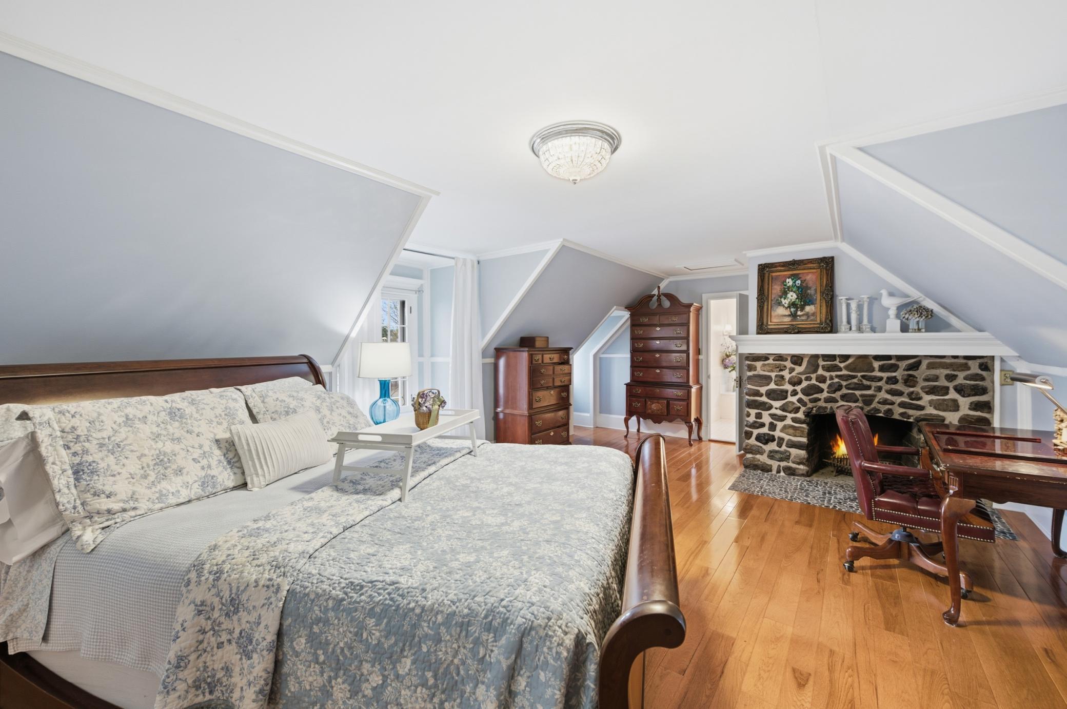 13001 Twilight Road - Primary Bedroom with Wood-Burning Fireplace, Stones Hand Selected from Canadian Mountains