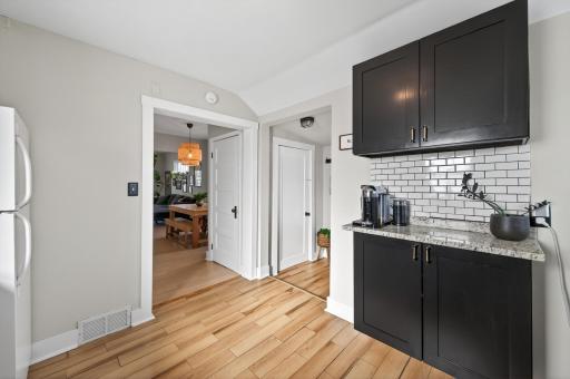 Great storage, ample counter space, subway tile backsplash, updated flooring, make this kitchen a true delight!