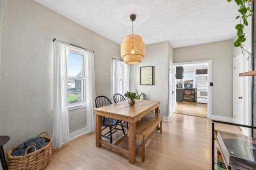 Refreshed kitchen cabinetry, updated lighting, interior paint touch-ups, and exterior improvements including deck and step refinishing. Additional upgrades over time include flooring, kitchen electrical, appliances, and exterior paint.