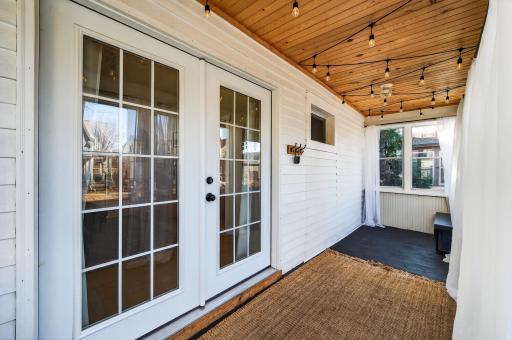 Sunlight pours through the home, with a front sun porch that becomes the perfect spot for morning coffee.