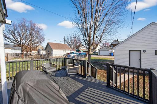 Freshly painted back deck, perfect for backyard gatherings and grilling!