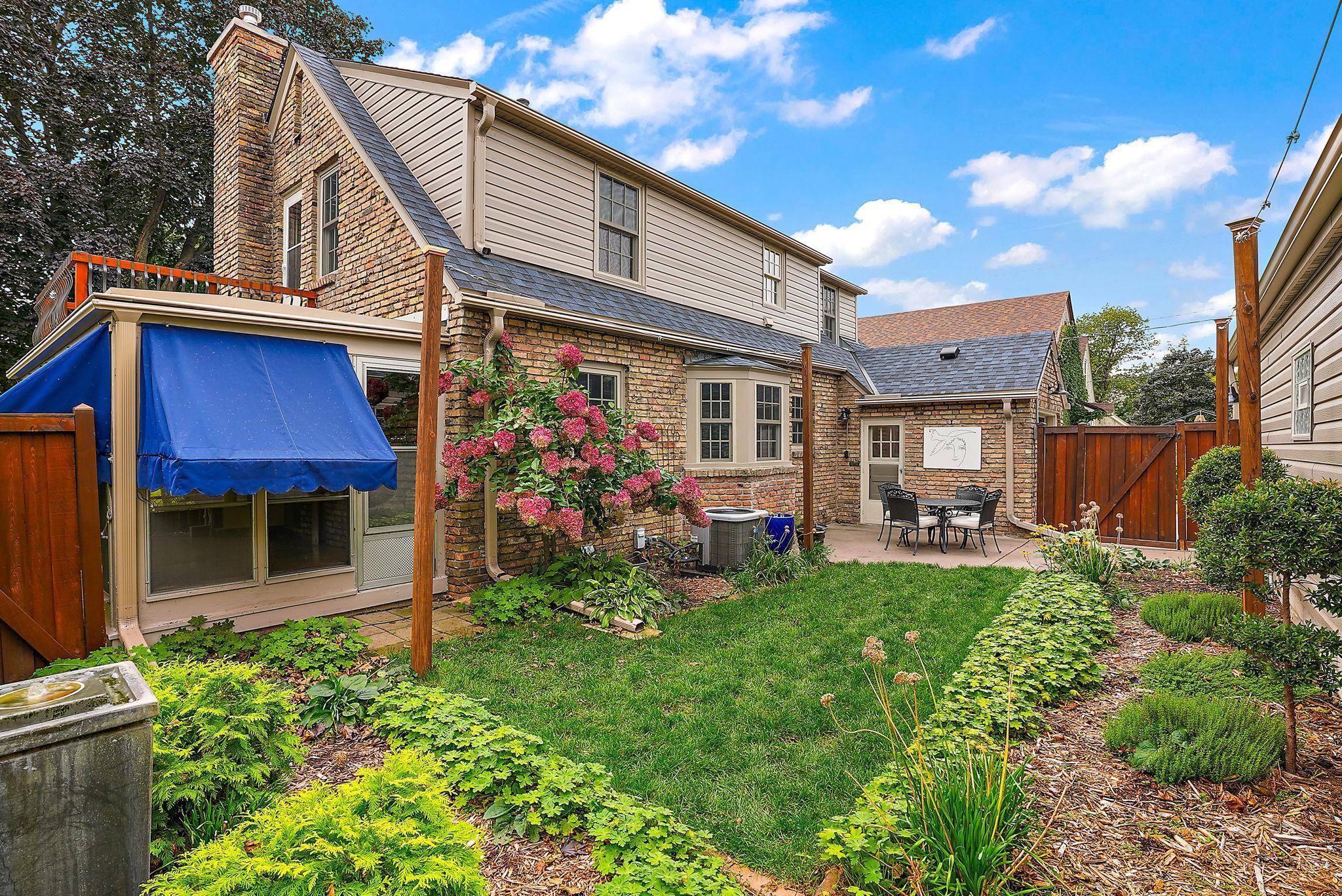 Three season porch is accessible from the backyard